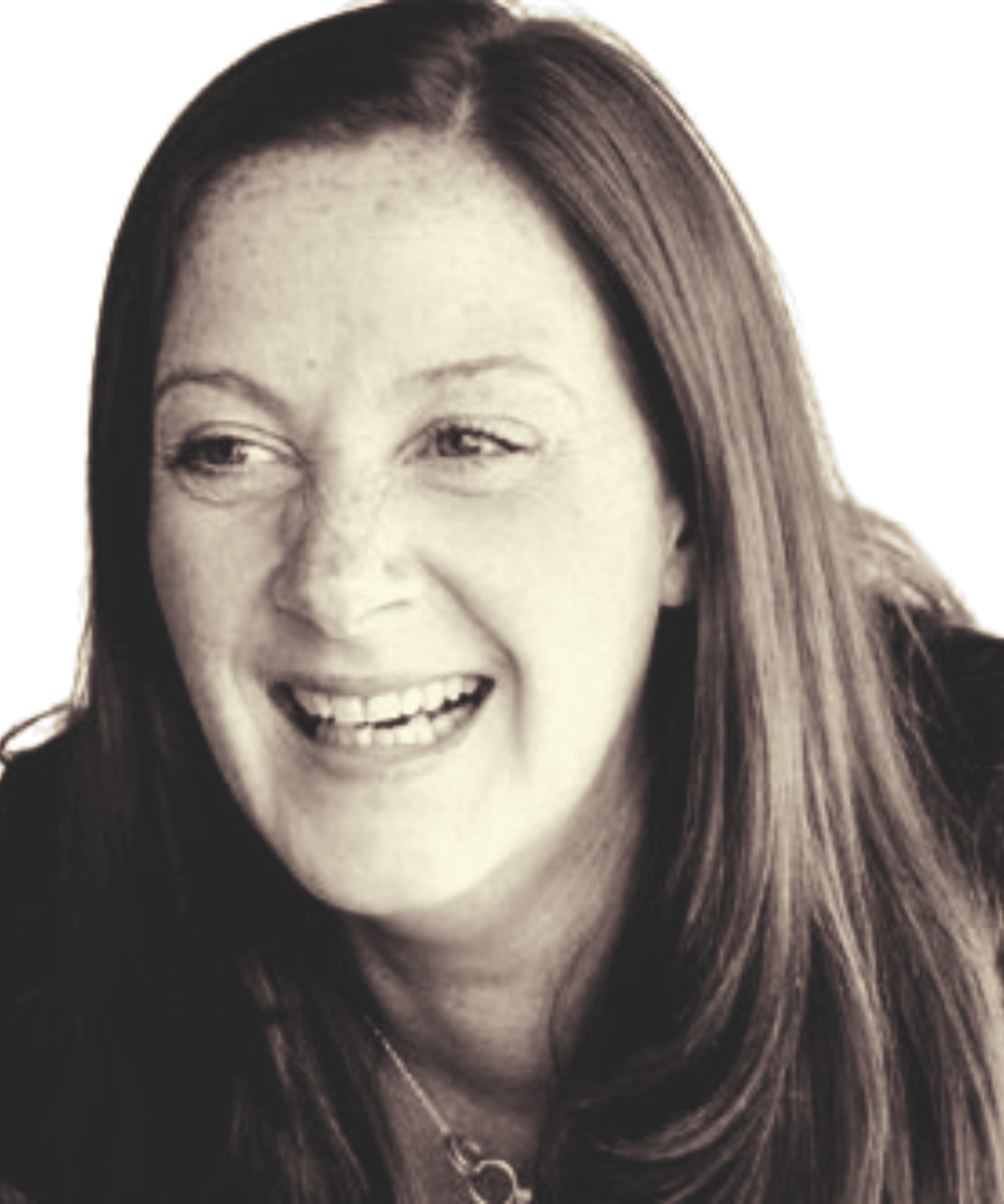 A black and white photo of a woman smiling